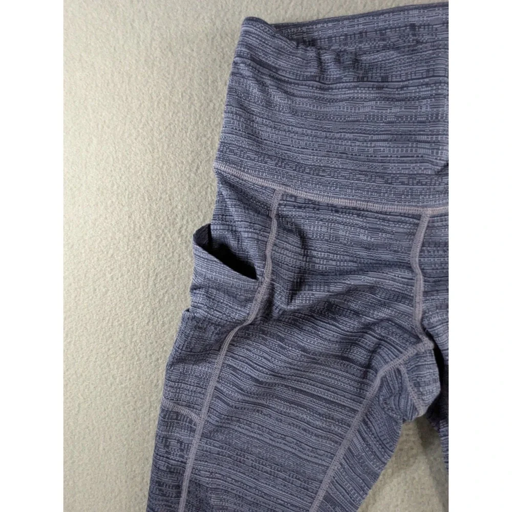 ATHLETA ULTIMATE STASH POCKET PRINTED CAPRI LEGGINGS BLUE XXS